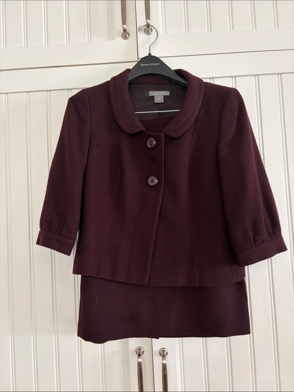 Ann Taylor 3/4 sleeve burgundy jacket and skirt.